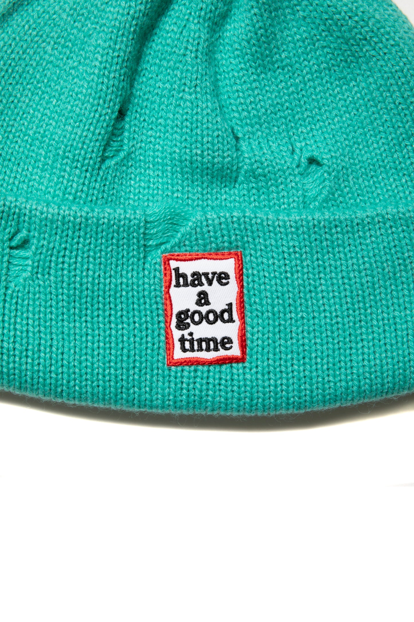 FRAME RIPPED BEANIE TURQUOISE