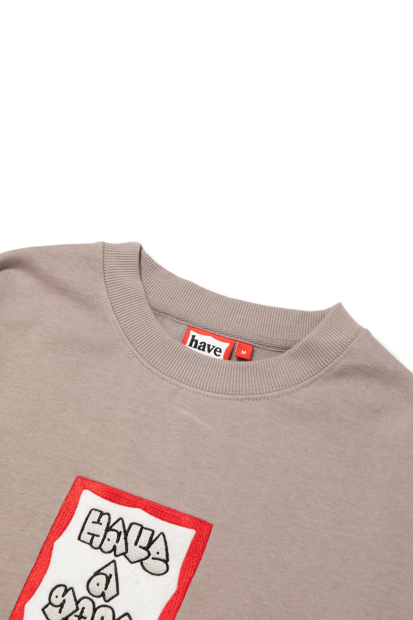 MOSU FRAME EMB CREWNECK FL GREIGE